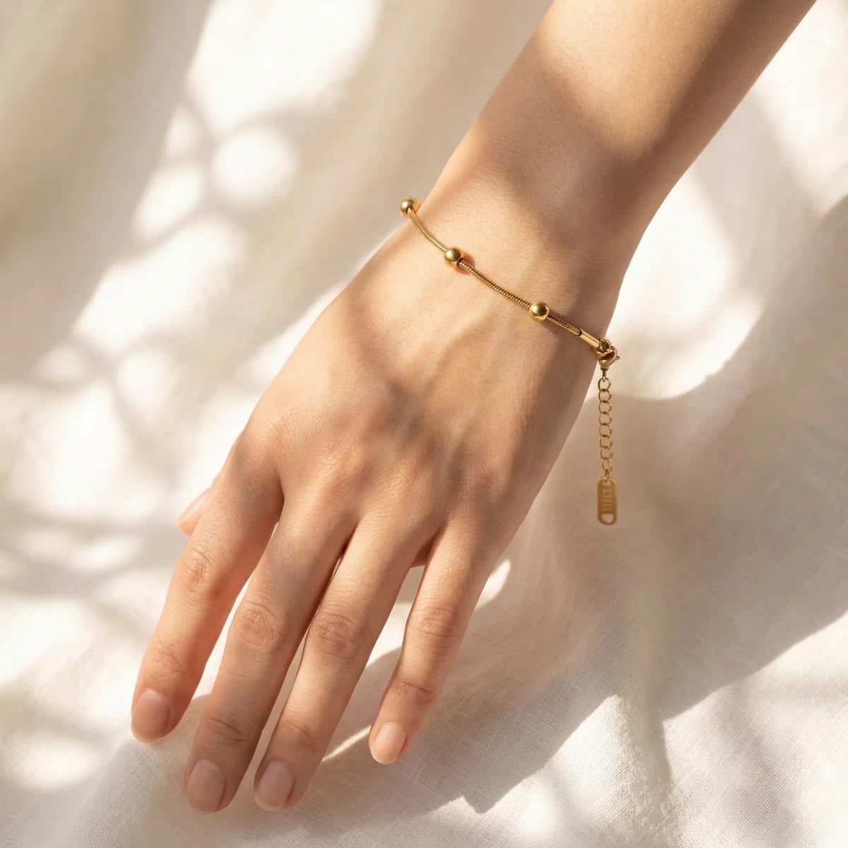 Golden Beaded Station Snake Chain Bracelet
